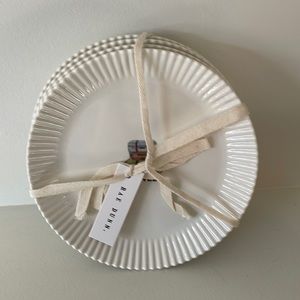 Rae Dunn Four-Plate Set “Travel. Journey. Memories. Explore.”